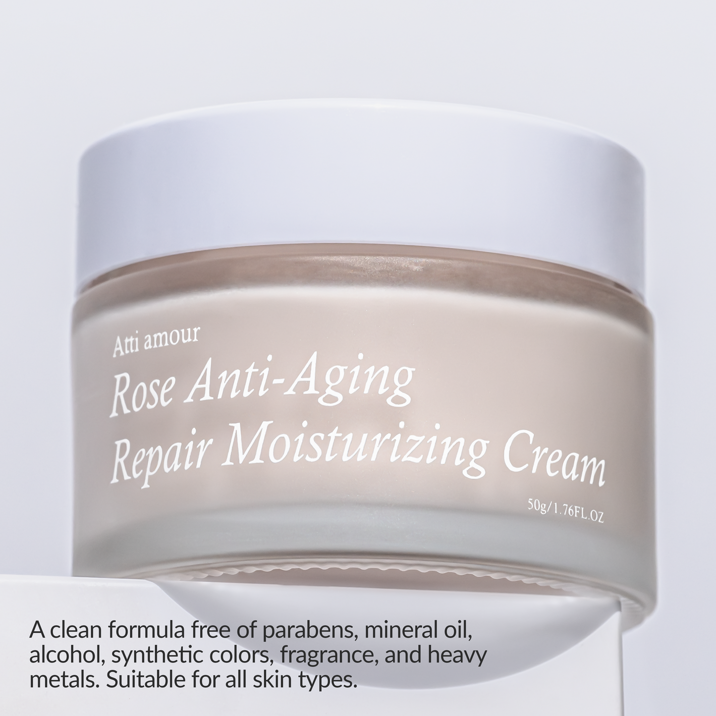 Clean moisturizing cream with rosewater, free from parabens, mineral oil, and synthetic colors.